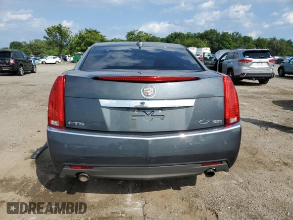 2013 Cadillac CTS Premium с VIN 1G6DP5E34D0151591, выставлен на аукционе Copart как лот 63668325 с пробегом 59 477 миль миль и Списание • Salvage title. История ставок и продаж доступна на DreamBid. Изображение 6.