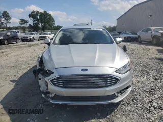 2017 Ford Fusion SE z VIN 3FA6P0H74HR164747, wystawiony jako Copart lot #56139855 z przebiegiem 105 769 mil mil oraz Szkoda całkowita • Salvage title. Historia ofert i sprzedaży dostępna na DreamBid. Obrazek 5.