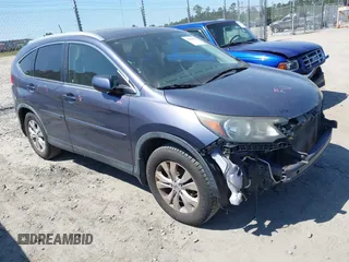 2012 Honda CR-V EX-L with VIN JHLRM4H78CC027960, listed as a IAAI auction lot 42029819 with 165,000 mi miles. Bid and sale history available at carsss.com. Image 1.
