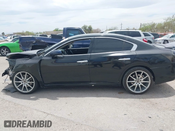 2012 Nissan Maxima S with VIN 1N4AA5AP1CC819585, listed as a IAAI auction lot 42244364 with 180,488 mi miles and . Bid and sale history available at DreamBid. Image 15.