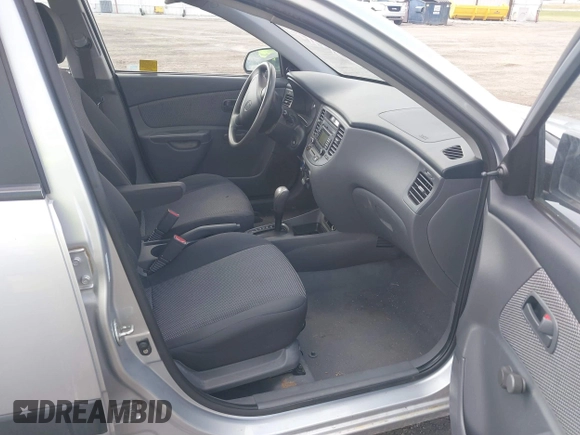 2009 Kia Rio LX with VIN KNADE223796521410, listed as a IAAI auction lot 41887883 with 82,360 mi miles and . Bid and sale history available at DreamBid. Image 5.