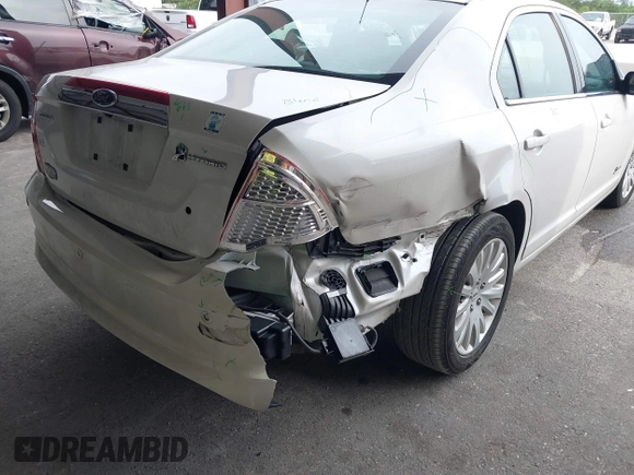 2010 Ford Fusion Hybrid with VIN 3FADP0L35AR182062, listed as a IAAI auction lot 42399945 with 101,565 mi miles and . Bid and sale history available at DreamBid. Image 6.