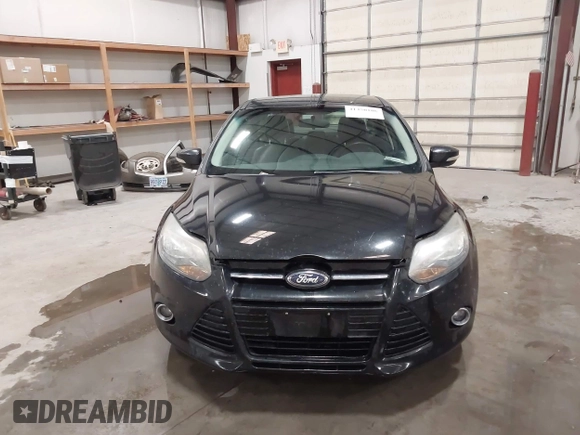 2014 Ford Focus Titanium with VIN 1FADP3J22EL199563, listed as a IAAI auction lot 41450106 with 129,271 mi miles. Bid and sale history available at carsss.com. Image 12.