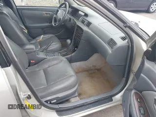 2001 Toyota Camry LE z VIN 4T1BF28K71U127407, wystawiony jako IAAI lot #42247606 z przebiegiem 289 995 mil mil oraz . Historia ofert i sprzedaży dostępna na DreamBid. Obrazek 5.