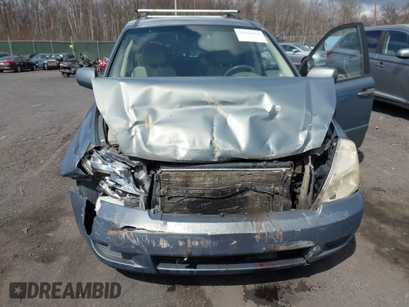 2009 Kia Sedona LX with VIN KNDMB233696299758, listed as a IAAI auction lot 41929906 with 214,445 mi miles. Bid and sale history available at carsss.com. Image 6.