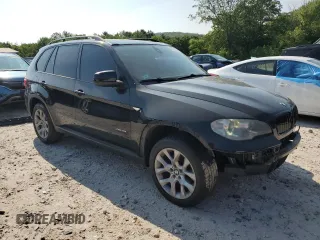 2012 BMW X5 35i with VIN 5UXZV4C57CL756062, listed as a Copart auction lot 65752145 with 160,860 mi miles and Clean title. Bid and sale history available at DreamBid. Image 4.