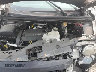 2015 Chevrolet Sonic LS with VIN 1G1JA5SH6F4152196, listed as a Copart auction lot 59096455 with 128,113 mi miles and Salvage title. Bid and sale history available at DreamBid. Image 11.