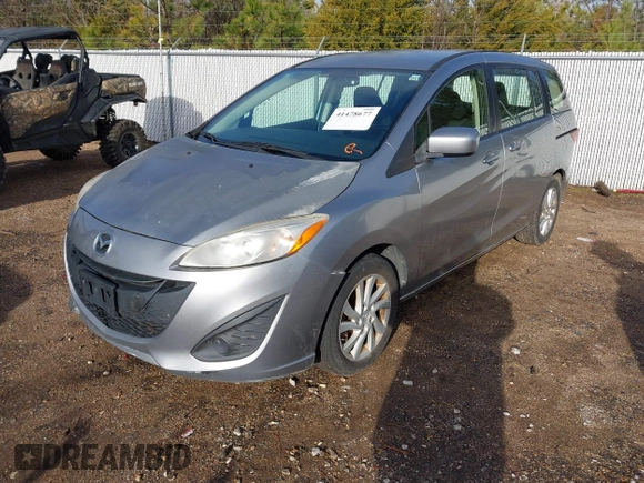 2012 Mazda 5 Sport z VIN JM1CW2BL6C0129489, wystawiony jako IAAI lot #41478677 z przebiegiem 259 261 mil mil oraz . Historia ofert i sprzedaży dostępna na DreamBid. Obrazek 2.