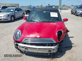 2006 MINI Convertible with VIN WMWRF33556TG14466, listed as a IAAI auction lot 42096368 with 120,230 mi miles and . Bid and sale history available at DreamBid. Image 13.