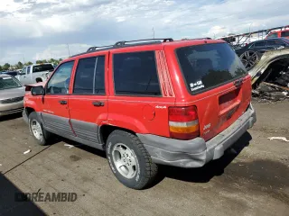 1996 Jeep Grand Cherokee Laredo with VIN 1J4GZ58S0TC170623, listed as a Copart auction lot 68019014 with 174,192 mi miles and Salvage Title. Bid and sale history available at carsss.com. Image 2.