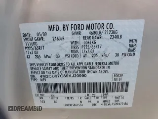 2009 Mercury Mariner Premier z VIN 4M2CU97G89KJ20990, wystawiony jako Copart lot #42984005 z przebiegiem Nie podano mil oraz Szkoda całkowita • Salvage title. Historia ofert i sprzedaży dostępna na DreamBid. Obrazek 13.