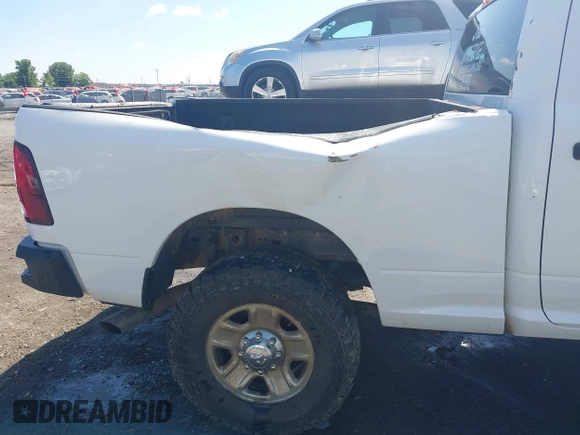 2017 Ram 2500 Tradesman with VIN 3C6UR5CLXHG634148, listed as a IAAI auction lot 42211758 with 176,692 mi miles and . Bid and sale history available at DreamBid. Image 17.