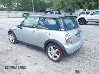 2002 MINI Hardtop with VIN WMWRC33432TE11649, listed as a IAAI auction lot 42583224 with 114,339 mi miles and . Bid and sale history available at DreamBid. Image 3.