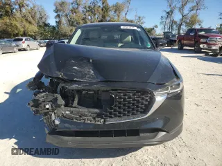 2023 Mazda CX-5 S Select with VIN JM3KFBBM2P0237142, listed as a Copart auction lot 47841235 with 16,911 mi miles and Salvage Title. Bid and sale history available at DreamBid. Image 5.