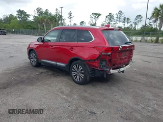 2019 Mitsubishi Outlander SE with VIN JA4AD3A32KZ050801, listed as a IAAI auction lot 42010844 with 72,710 mi miles and . Bid and sale history available at DreamBid. Image 3.