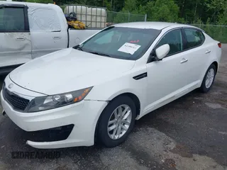 2013 Kia Optima LX z VIN KNAGM4A72D5366828, wystawiony jako IAAI lot #42106525 z przebiegiem 159 564 mil mil oraz . Historia ofert i sprzedaży dostępna na DreamBid. Obrazek 19.