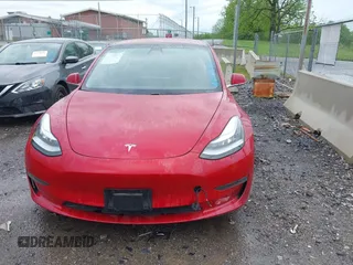 2018 Tesla Model 3 Long Range Battery with VIN 5YJ3E1EA6JF052659, listed as a IAAI auction lot 42093903 with 49,255 mi miles and . Bid and sale history available at DreamBid. Image 13.