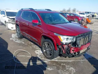 2017 GMC Acadia Denali with VIN 1GKKNPLS9HZ138857, listed as a IAAI auction lot 41411063 with 118,993 mi miles. Bid and sale history available at carsss.com. Image 1.