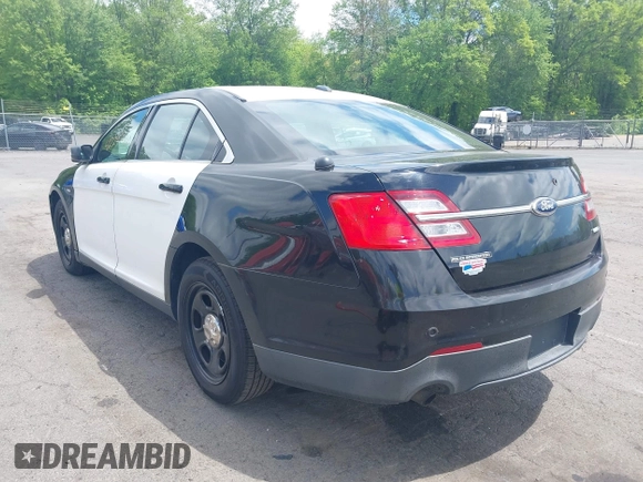 2014 Ford Police Interceptor with VIN 1FAHP2MKXEG185863, listed as a IAAI auction lot 42297860 with 115,188 mi miles and . Bid and sale history available at DreamBid. Image 3.