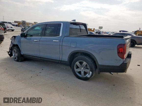 2023 Honda Ridgeline RTL-E with VIN 5FPYK3F76PB036572, listed as a Copart auction lot 54717085 with 34,516 mi miles and Salvage title. Bid and sale history available at DreamBid. Image 2.