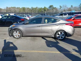 2013 Hyundai Elantra GLS z VIN 5NPDH4AE7DH174538, wystawiony jako IAAI lot #41428026 z przebiegiem 158 066 mil mil oraz . Historia ofert i sprzedaży dostępna na DreamBid. Obrazek 14.