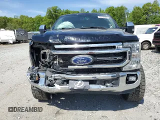 2021 Ford Super Duty F-250 SRW XL with VIN 1FT7W2BT1MEC51277, listed as a Copart auction lot 54199165 with 99,324 mi miles and Salvage Title. Bid and sale history available at carsss.com. Image 5.