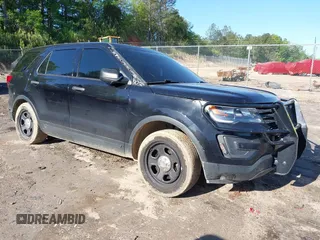 2019 Ford Police Interceptor Utility z VIN 1FM5K8AT0KGA31584, wystawiony jako IAAI lot #42011705 z przebiegiem 145 304 mil mil oraz . Historia ofert i sprzedaży dostępna na DreamBid. Obrazek 1.