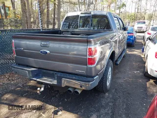 2014 Ford F-150 XL with VIN 1FTFW1EF9EKF61918, listed as a IAAI auction lot 41864650 with 217,839 mi miles. Bid and sale history available at carsss.com. Image 4.