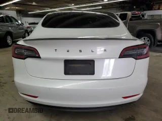 2021 Tesla Model 3 Standard Range Plus z VIN 5YJ3E1EA4MF943036, wystawiony jako Copart lot #54008355 z przebiegiem 62 981 mil mil oraz Szkoda całkowita • Salvage title. Historia ofert i sprzedaży dostępna na DreamBid. Obrazek 6.