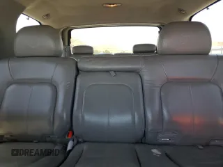 2002 Cadillac Escalade z VIN 1GYEC63T42R189976, wystawiony jako Copart lot #57852565 z przebiegiem 243 089 mil mil oraz Szkody całkowita. Historia ofert i sprzedaży dostępna na DreamBid. Obrazek 10.