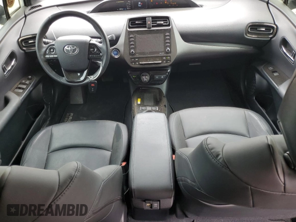 2021 Toyota Prius L Eco with VIN JTDKAMFU4M3129824, listed as a Copart auction lot 57788635 with 38,556 mi miles and Salvage title. Bid and sale history available at DreamBid. Image 8.