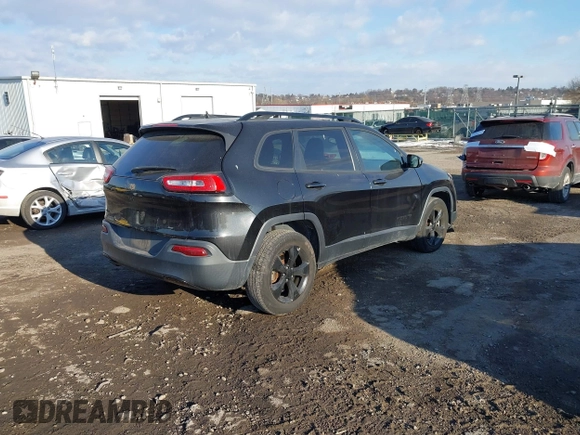 2016 Jeep Cherokee Latitude with VIN 1C4PJMCB1GW153316, listed as a IAAI auction lot 41430871 with 107,684 mi miles and . Bid and sale history available at carsss.com. Image 4.