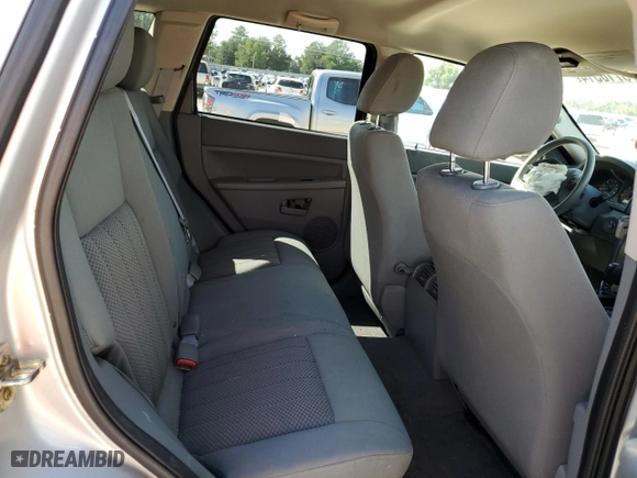 2005 Jeep Grand Cherokee Laredo with VIN 1J4HS48N65C543325, listed as a Copart auction lot 73710514 with 52,153 mi miles and Salvage Title. Bid and sale history available at carsss.com. Image 11.