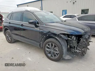 2023 Volkswagen Tiguan SE with VIN 3VVNB7AX2PM095304, listed as a Copart auction lot 56886785 with 29,894 mi miles and Salvage title. Bid and sale history available at DreamBid. Image 4.