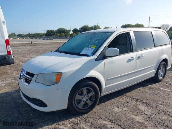 2012 Dodge Grand Caravan SXT with VIN 2C4RDGCGXCR211925, listed as a IAAI auction lot 41915648 with 150,885 mi miles. Bid and sale history available at carsss.com. Image 17.