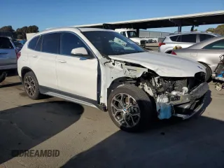 2021 BMW X1 xDrive28i with VIN WBXJG9C09M5S71263, listed as a Copart auction lot 46374565 with 61,537 mi miles and Salvage Title. Bid and sale history available at carsss.com. Image 4.