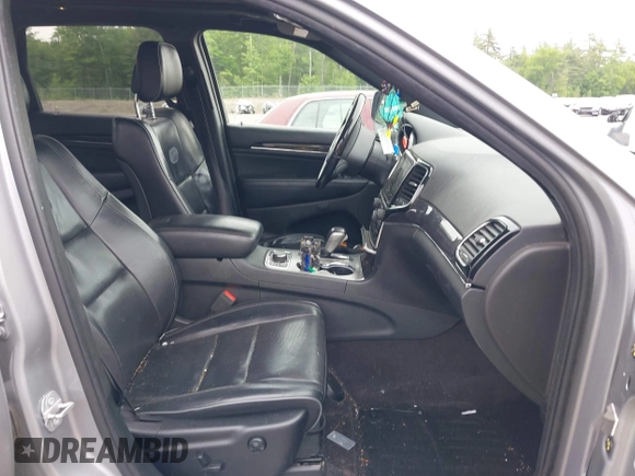 2019 Jeep Grand Cherokee High Altitude with VIN 1C4RJFCG1KC570199, listed as a IAAI auction lot 42464644 with 94,126 mi miles and . Bid and sale history available at DreamBid. Image 5.