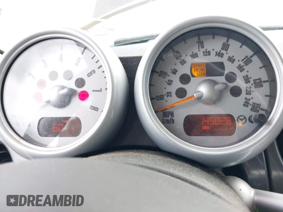 2005 MINI Hardtop with VIN WMWRC33555TK61361, listed as a IAAI auction lot 41940037 with 145,028 mi miles and . Bid and sale history available at DreamBid. Image 7.