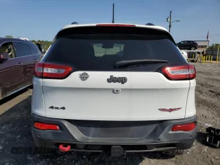 2015 Jeep Cherokee Trailhawk with VIN 1C4PJMBS6FW558653, listed as a Copart auction lot 51066195 with 32,905 mi miles and Salvage Title. Bid and sale history available at carsss.com. Image 6.