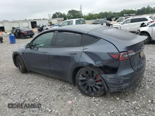 2022 Tesla Model Y Performance with VIN 7SAYGDEF7NF507184, listed as a Copart auction lot 58329875 with 98,320 mi miles and Salvage title. Bid and sale history available at DreamBid. Image 2.