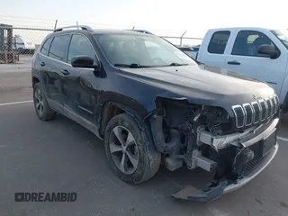 2019 Jeep Cherokee Limited with VIN 1C4PJMDXXKD245877, listed as a IAAI auction lot 41984332 with 103,300 mi miles. Bid and sale history available at carsss.com. Image 1.