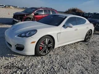 2012 Porsche Panamera Turbo with VIN WP0AC2A7XCL090859, listed as a Copart auction lot 80329554 with 165,622 mi miles and Salvage Title. Bid and sale history available at carsss.com. Image 1.