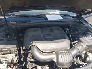 2015 Jeep Grand Cherokee Limited with VIN 1C4RJEBG5FC635136, listed as a IAAI auction lot 41894763 with 229,907 mi miles. Bid and sale history available at carsss.com. Image 10.