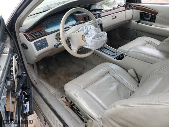 2000 Cadillac Eldorado with VIN 1G6EL12Y5YU166723, listed as a Copart auction lot 82612034 with 80,839 mi miles and Salvage Title. Bid and sale history available at carsss.com. Image 8.