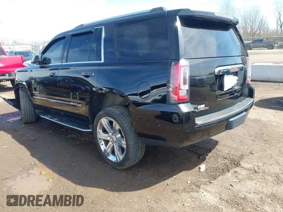 2017 GMC Yukon Denali with VIN 1GKS2CKJ0HR185365, listed as a IAAI auction lot 41856187 with 107,641 mi miles. Bid and sale history available at carsss.com. Image 3.