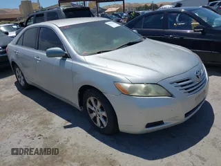 2007 Toyota Camry CE z VIN 4T1BE46K37U556909, wystawiony jako IAAI lot #42393260 z przebiegiem 256 792 mil mil oraz . Historia ofert i sprzedaży dostępna na DreamBid. Obrazek 1.
