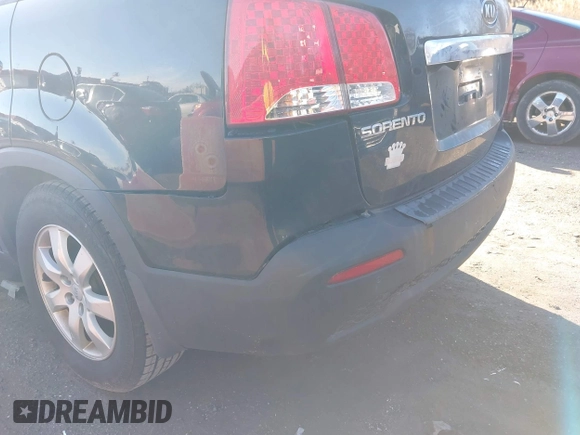 2012 Kia Sorento LX with VIN 5XYKT4A67CG231633, listed as a IAAI auction lot 41210382 with 217,055 mi miles. Bid and sale history available at carsss.com. Image 13.