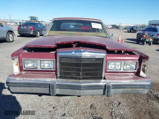 1984 Lincoln Town Car with VIN 1LNBP96FXEY671362, listed as a IAAI auction lot 41367432 with 81,205 mi miles. Bid and sale history available at carsss.com. Image 6.