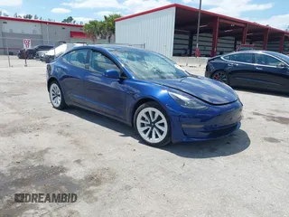 2023 Tesla Model 3 with VIN 5YJ3E1EA0PF658080, listed as a IAAI auction lot 42008846 with 32,301 mi miles. Bid and sale history available at carsss.com. Image 1.