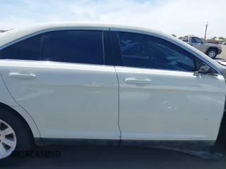 2011 Ford Taurus SE with VIN 1FAHP2DW1BG165371, listed as a IAAI auction lot 42164608 with 186,485 mi miles. Bid and sale history available at carsss.com. Image 14.